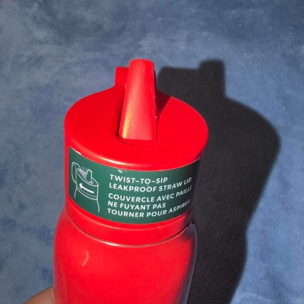 Starbucks Red 2024 Holiday Red Logo 20oz Twist to Sip Bottle Tumbler.
